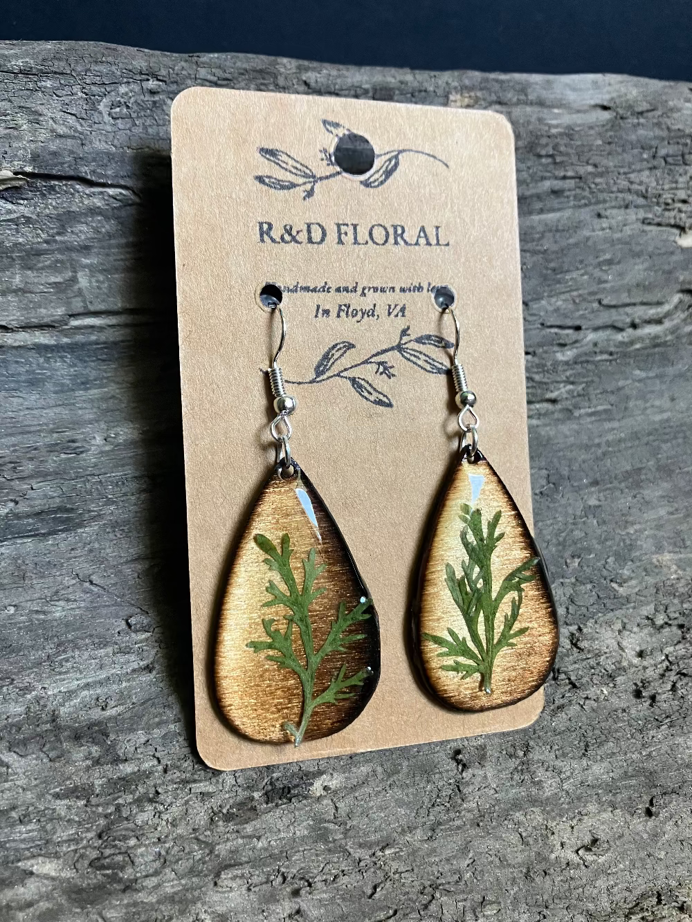 Handmade resin pendant with real Artemisia branches on flame-kissed wood base | Floral Jewelry by R and D Flora