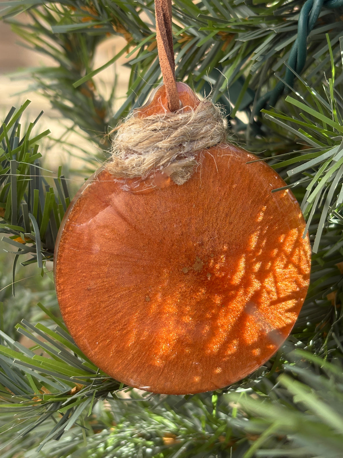 Back of the Queen Anne's Lace copper resin ornament showing the smooth reverse side