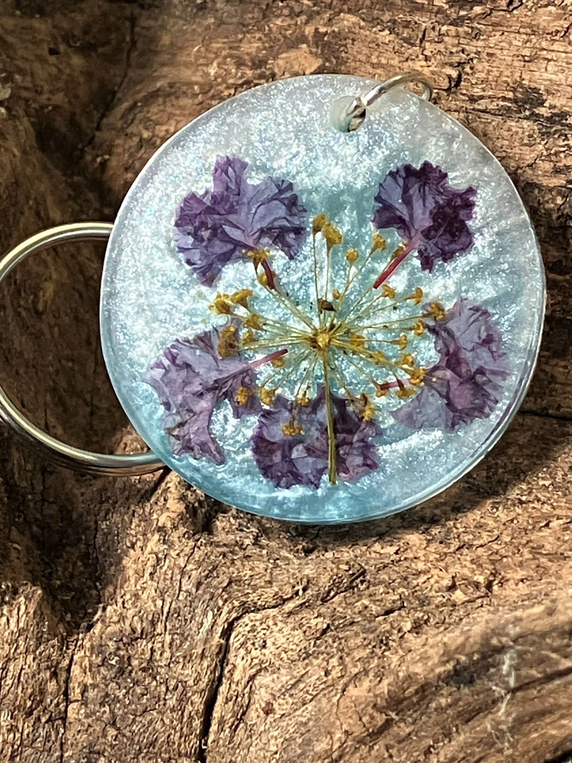 Shimmering white resin keychain with real crape myrtle flowers, handcrafted by R & D Floral.