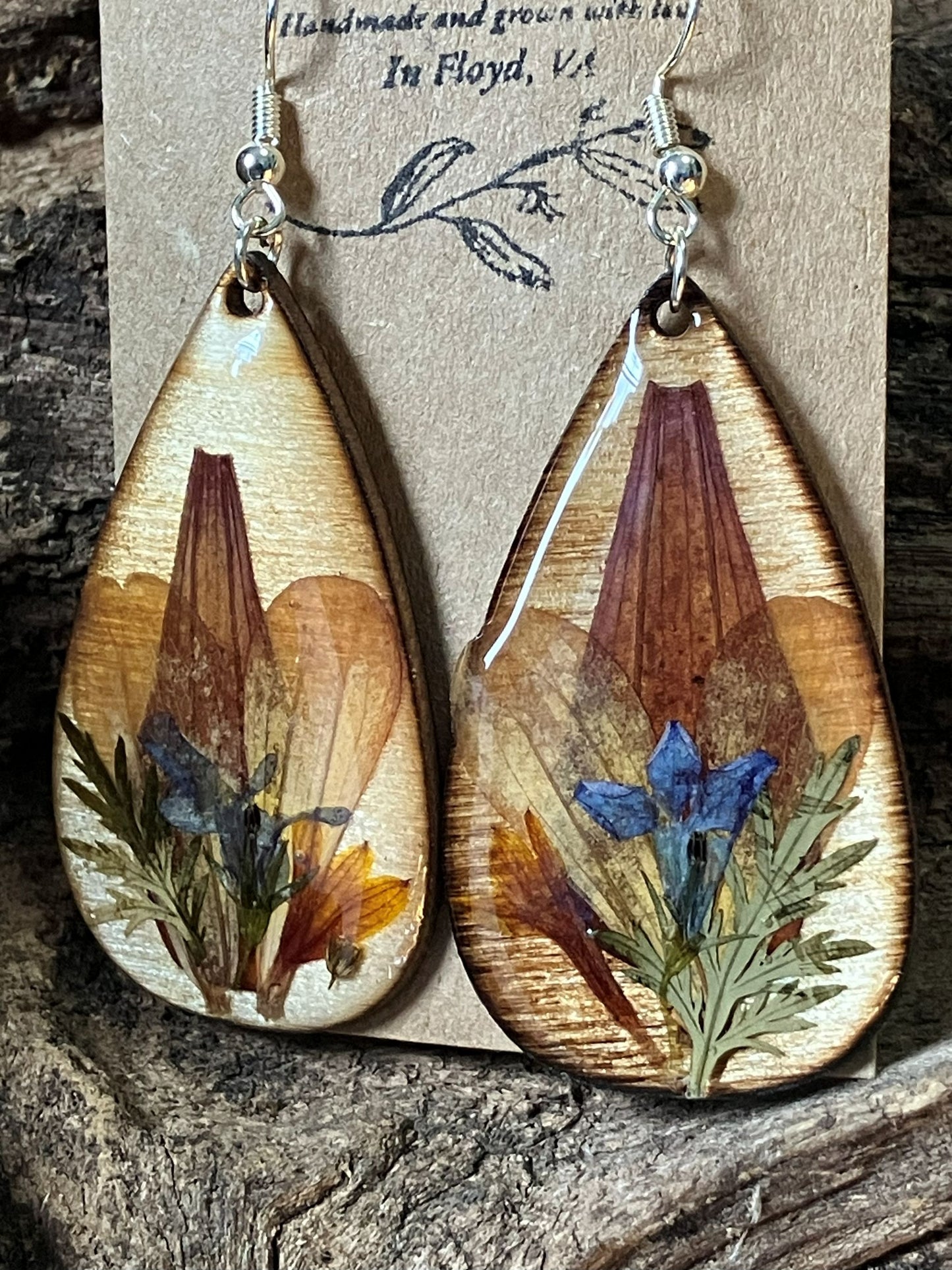 Artisan wooden earrings handmade with real zinnia and echibeckia flowers preserved in resin by R & D Floral.