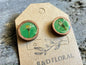 Hand-painted green wooden stud earrings with real thistle flowers preserved in resin by R & D Floral.