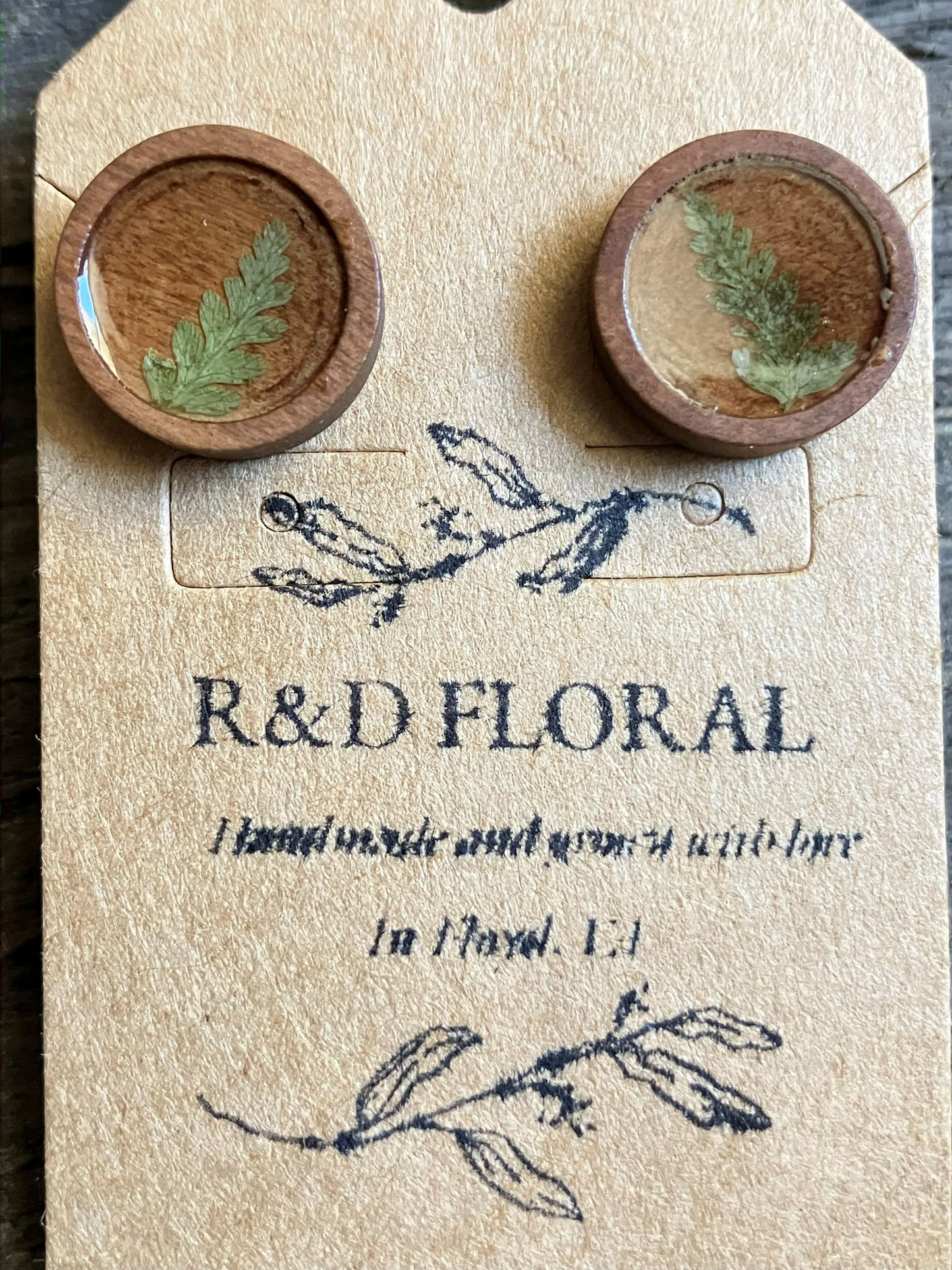 Handmade wooden stud earrings with real pressed fern leaves preserved in resin by R & D Floral.