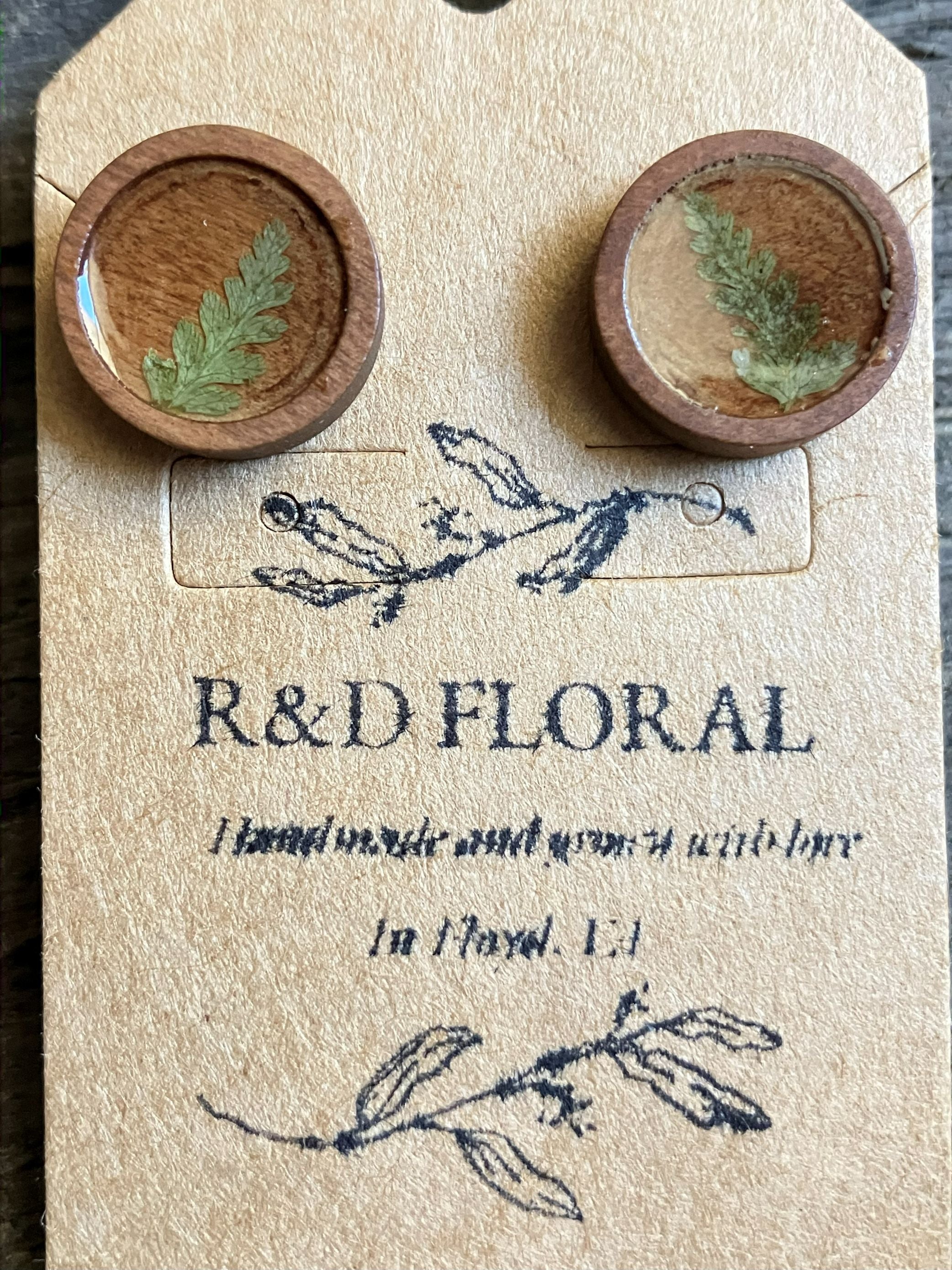 Handmade wooden stud earrings with real pressed fern leaves preserved in resin by R & D Floral.