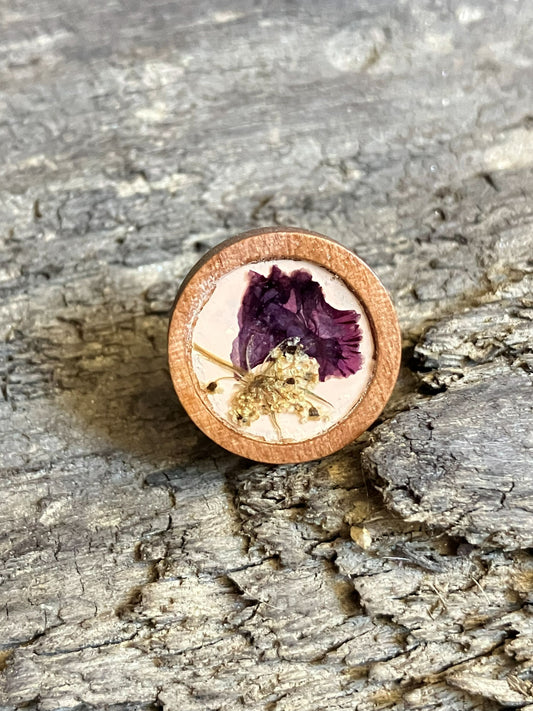 Hand-painted peach wooden stud earrings with real Queen Anne’s lace and crape myrtle encased in resin, handcrafted by R & D Floral.