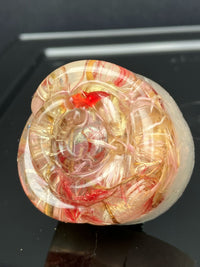 Drawer knob featuring real rose petals, gomphrena, and pansies preserved in resin over a creamy white background.