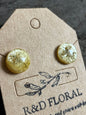Yellow resin stud earrings encasing real Queen Anne’s Lace flowers handmade by R&D Floral.