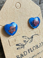 Cobalt blue resin stud earrings encasing real Lantana flowers handmade by R&D Floral.