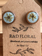 Wooden stud earrings encasing a small real Hypericum flower handmade by R & D Floral.