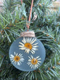 Pressed daisy ornament in grey resin on jute twine