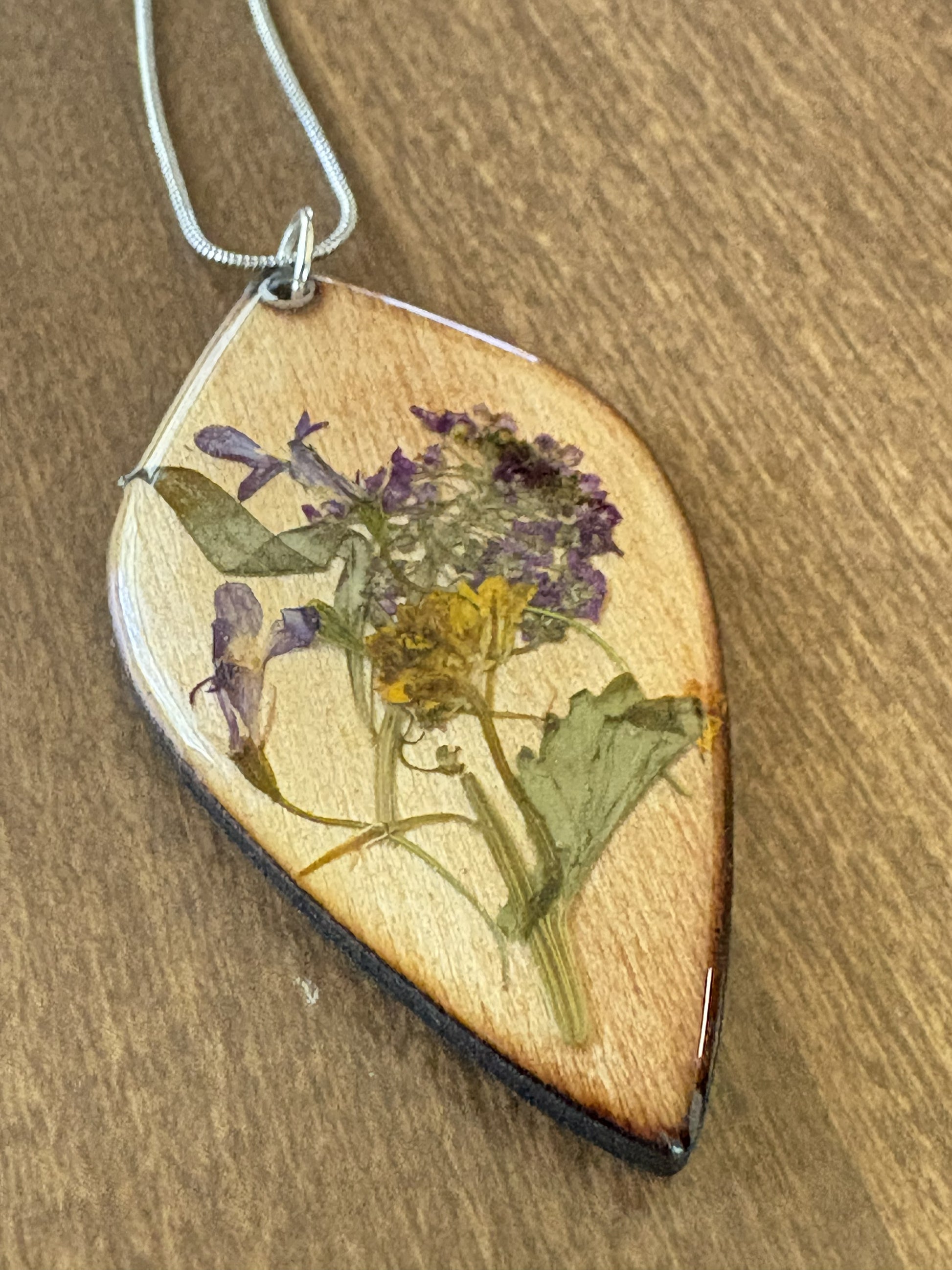 Lobularia and Garlic Mustard wooden pendant necklace angle 2
