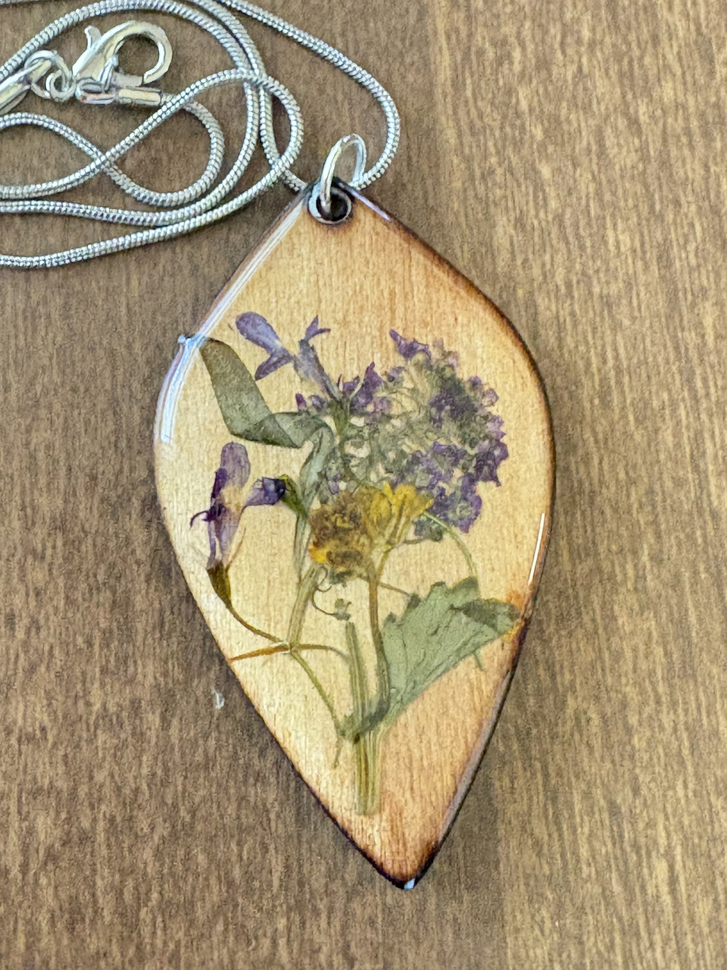 Lobularia and Garlic Mustard wooden pendant necklace angle 3